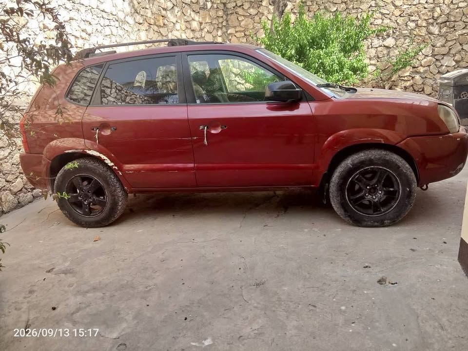 Hyundai Tucson 2006 — manuel essence